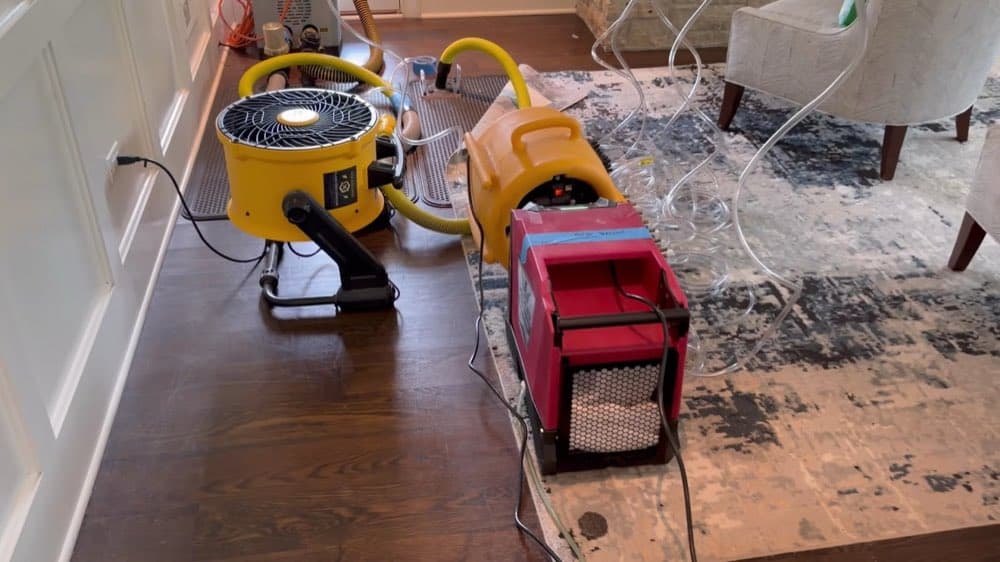 Flash Restoration crew documenting water damage on a real job