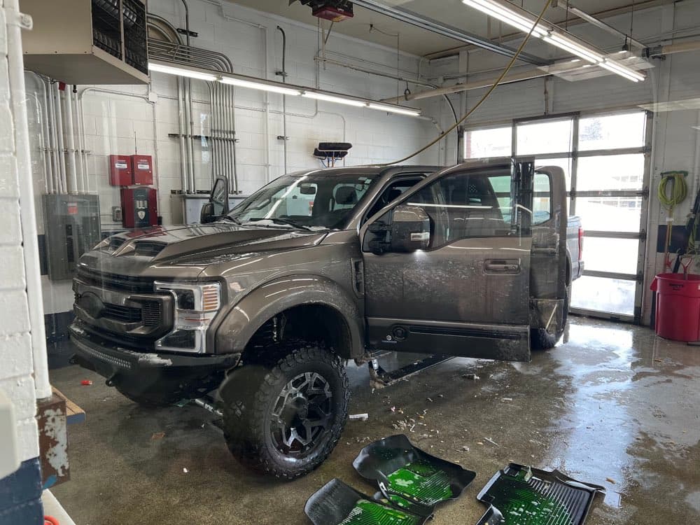 Truck in a flooded garage on an emergency call