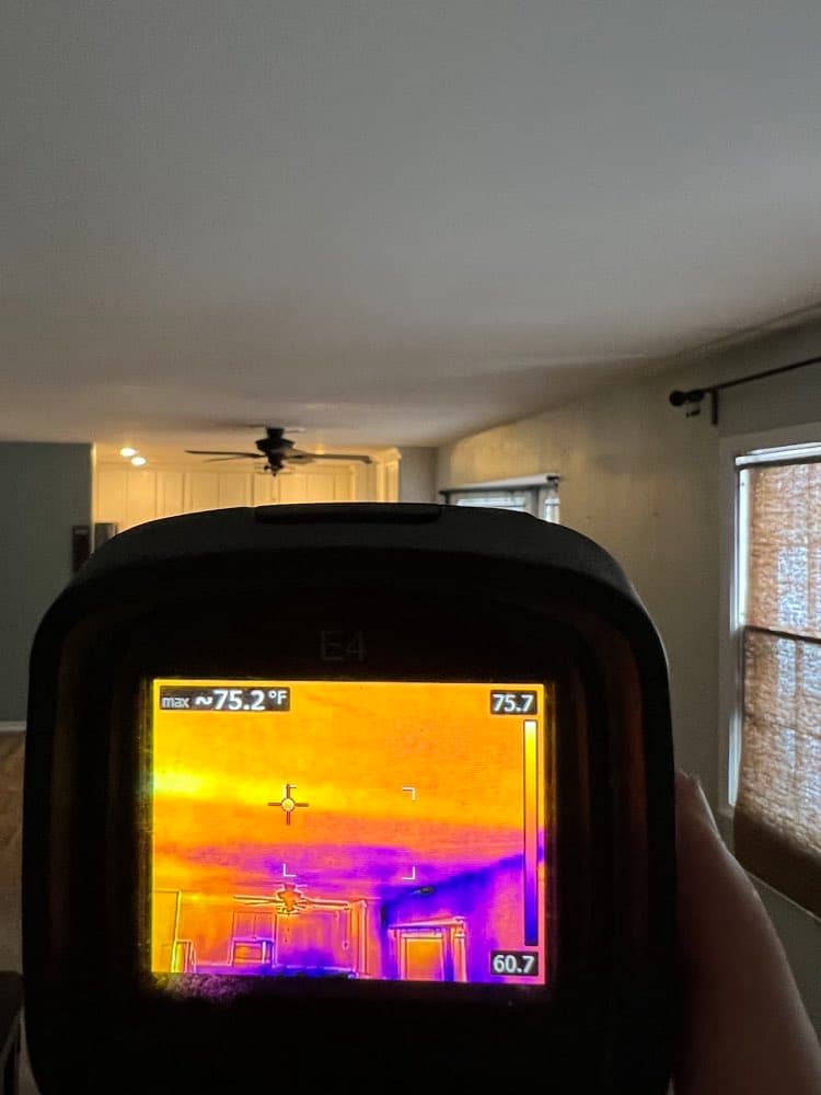 Thermal camera revealing moisture inside a wall