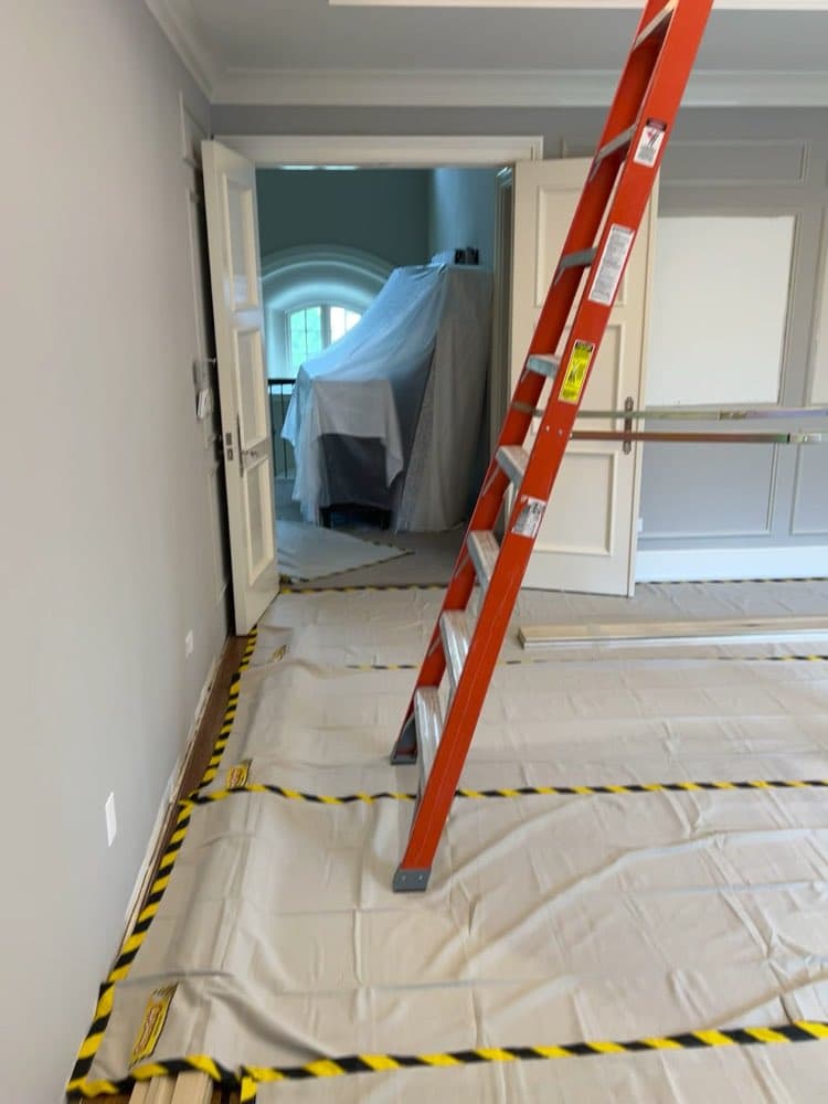Floor protection and containment taped off on a real job