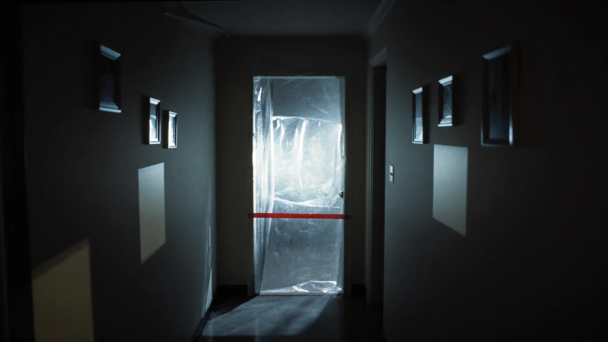 Hallway sealed behind containment plastic during contaminated-water cleanup